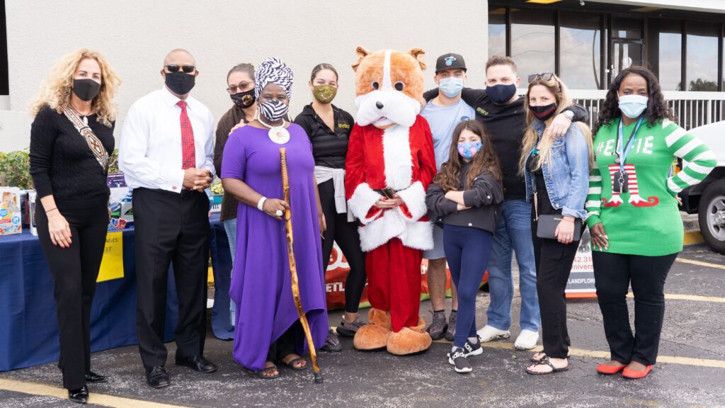 Petland Pembroke Pines picture of Petland staff donating toys for Christmas.